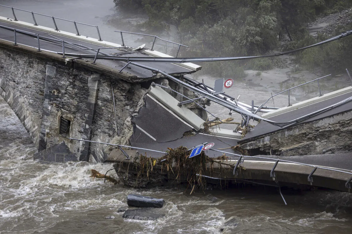 The bridge in Visletto destroyed due to the storm, in Visletto, in the Maggia Valley, southern Switzerland, on June 30, 2024. (Michael Buholzer/Keystone via AP)