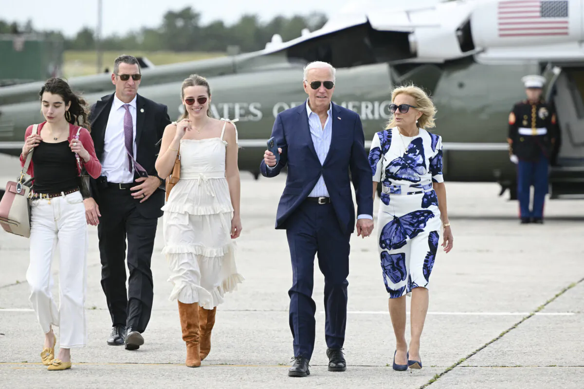 President Joe Biden and First Lady Jill Biden, along with granddaughters Natalie (L) and Finnegan (2nd L), walk from Marine One to board Air Force One at Francis S. Gabreski Airport in Westhampton Beach, New York on June 29, 2024. (Mandel Ngan/AFP)