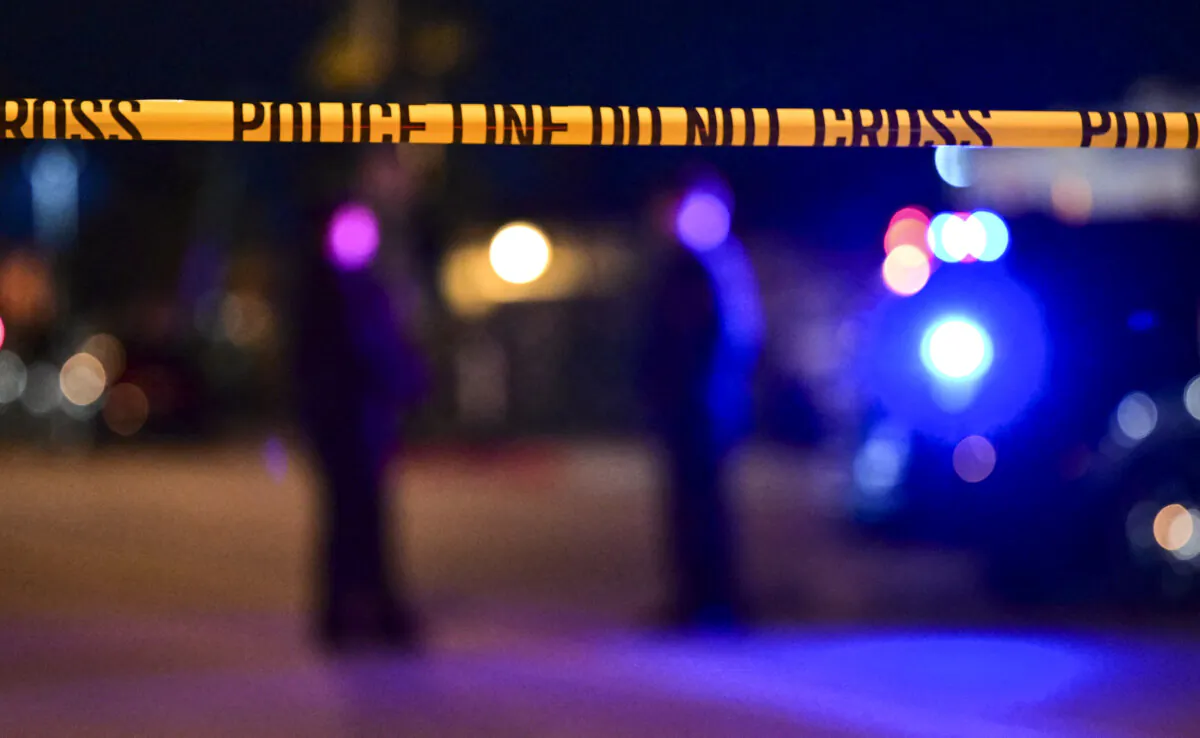 Police tape in a file photo. (Frederic J. Brown/AFP via Getty Images)