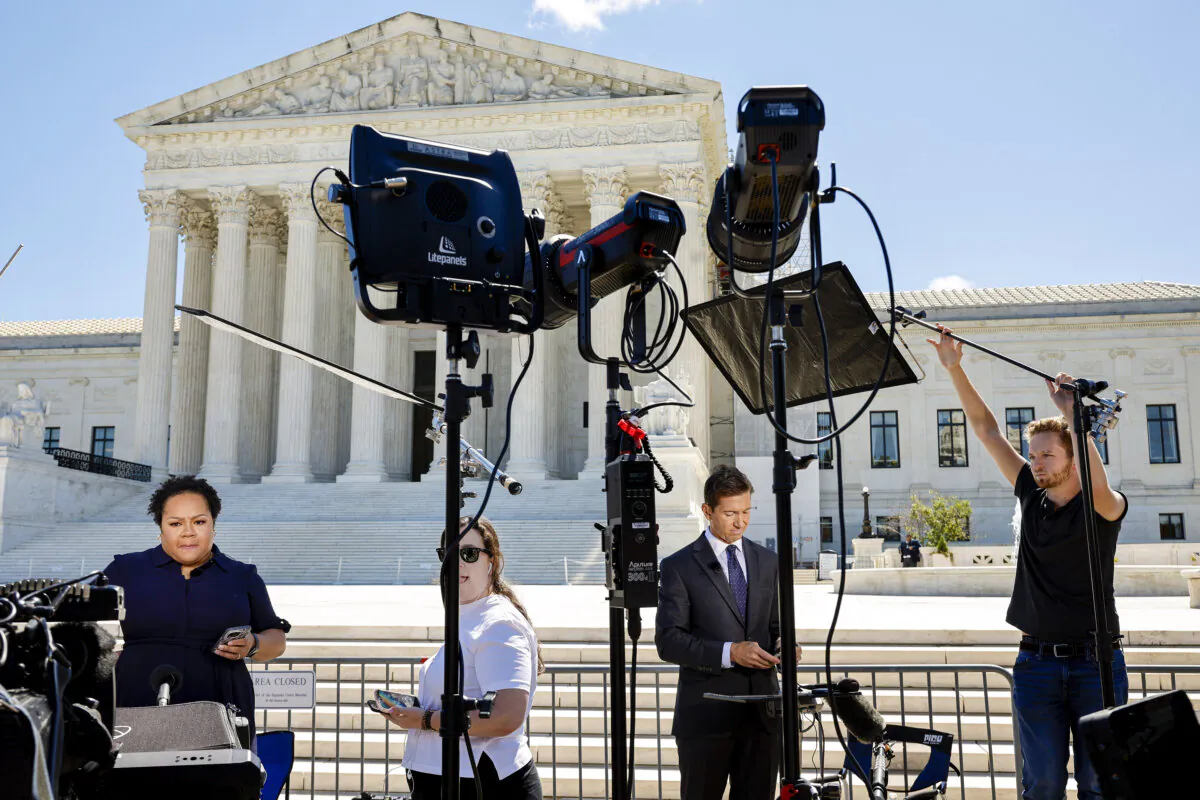 Journalists outside the U.S. Supreme Court in Washington on July 1, 2024. (Chip Somodevilla/Getty Images)