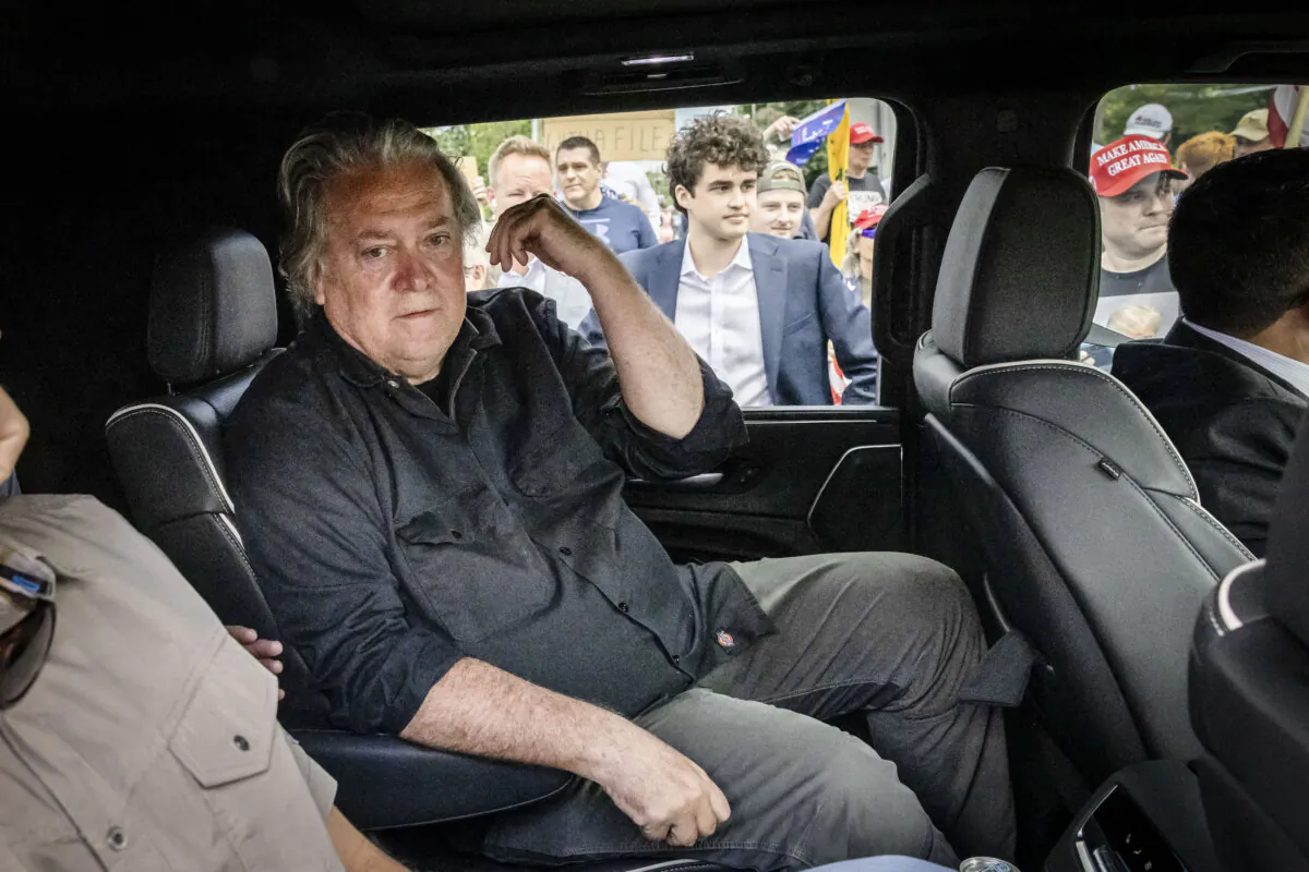 Former White House Chief Strategist Steve Bannon sits in a car after speaking at a press conference outside the federal correctional institution, in Danbury, Conn., on July 1, 2024. (YUKI IWAMURA/AFP via Getty Images)