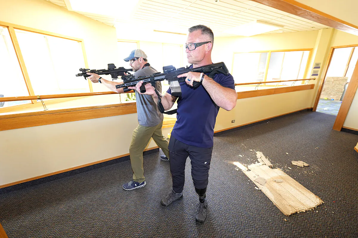 Denver Police Department Sgt. Justin Dodge takes part in a training exercise, in a former athletic club nw vacant in Lone Tree, Colo., on June 7, 2024. (David Zalubowski/AP Photo)