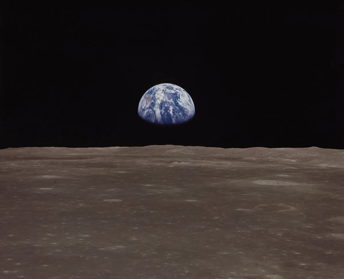 The Earth rises over the horizon of the moon, as seen during the Apollo 11 lunar landing mission in July 1969. (Space Frontiers/Getty Images)