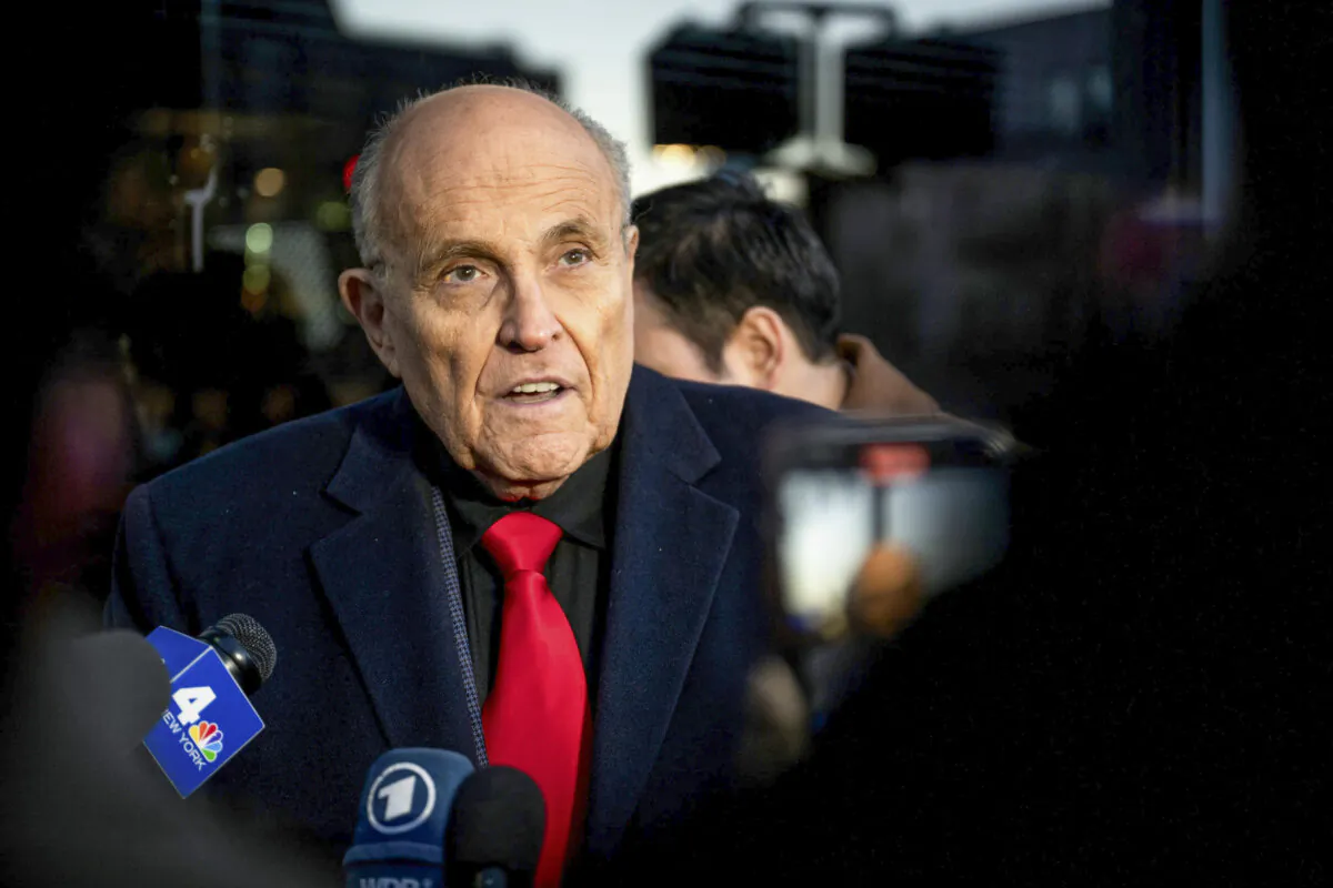 Rudy Giuliani speaks to members of the media in Manchester, N.H., on Jan. 21, 2024. (Brandon Bell/Getty Images)