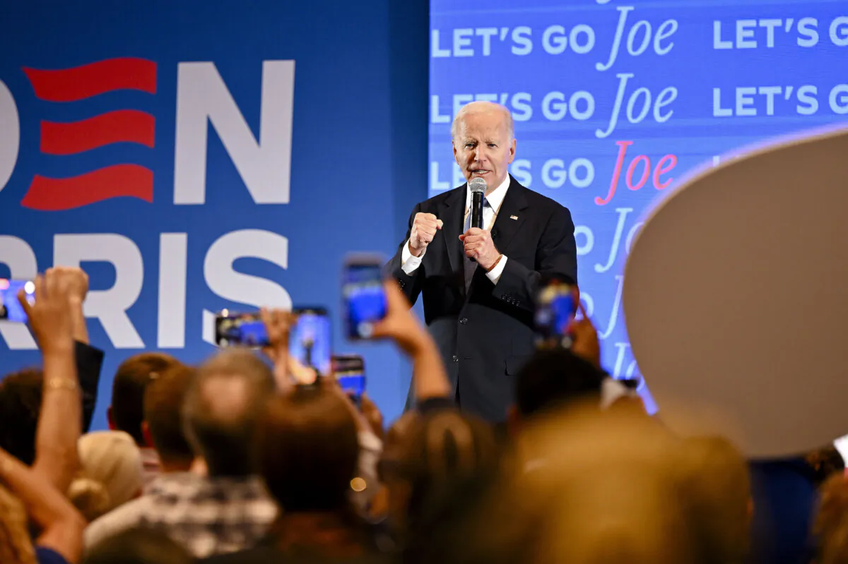 Supporters greet President Joe Biden with a light display at his debate watch party at Hyatt Regency Atlanta in Atlanta on June 27, 2024. (Derek White/Getty Images for DNC)