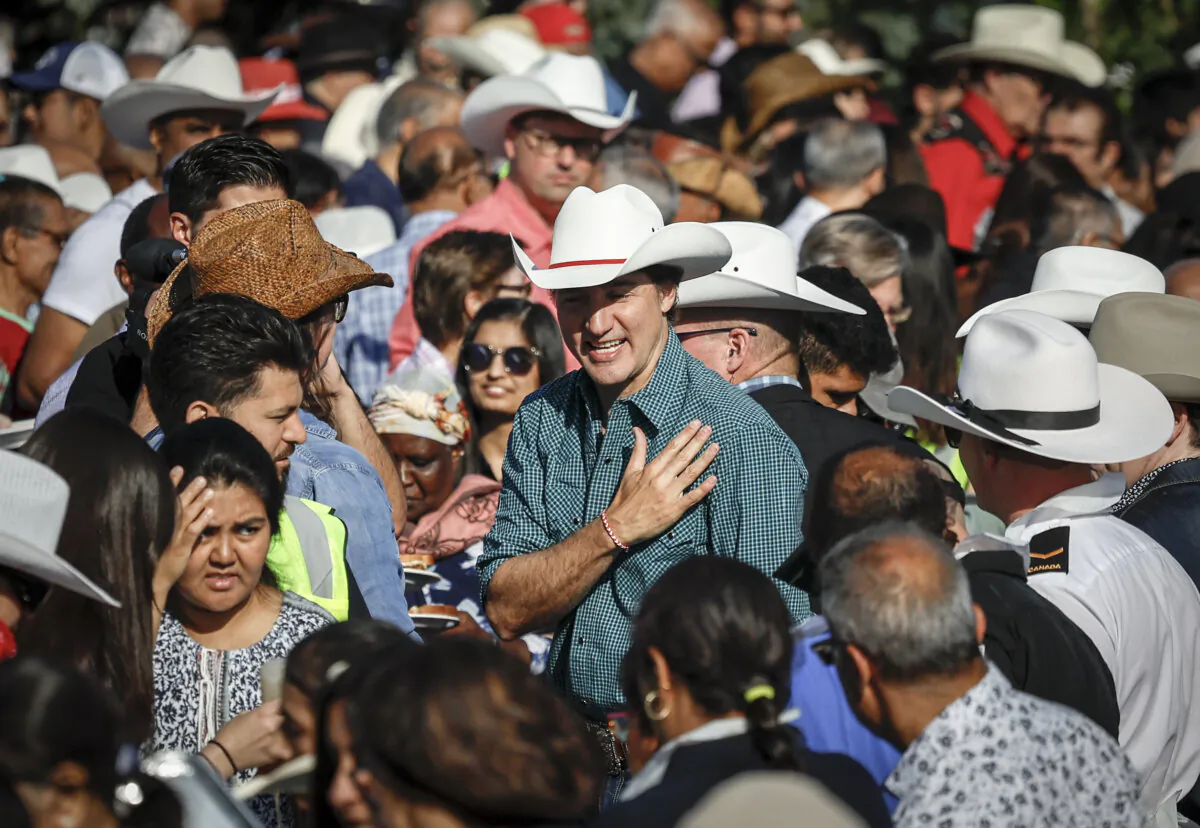 Prime Minister Justin Trudeau attends a Stampede pancake breakfast in Calgary, on July 8, 2023. (The Canadian Press/Jeff McIntosh)