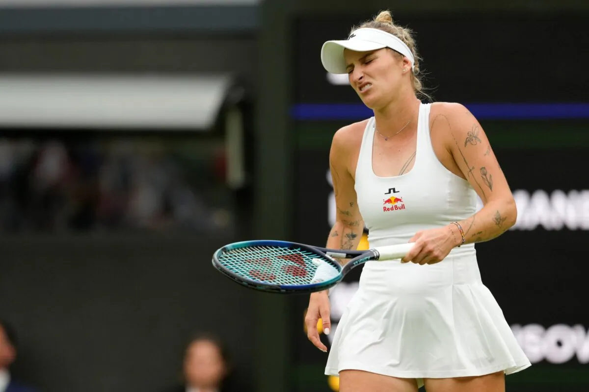 Marketa Vondrousova reacts during her first- round Wimbledon loss to Jessica Bouzas Maneiro in London on July 2, 2024. (Kirsty Wigglesworth/AP Photo)