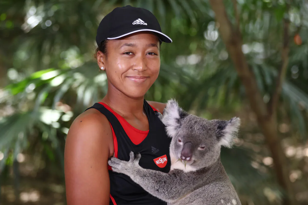 Naomi Osaka poses with Sprocket the koala ahead of the 2019 Brisbane International at Lone Pine Koala Sanctuary in Brisbane, Australia on Dec. 27, 2018. (Chris Hyde/Getty Images)