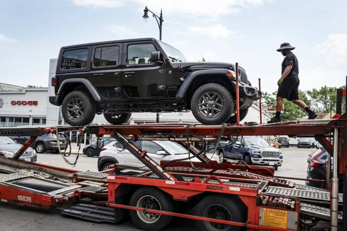 Jeep vehicles are delivered to a dealership in Chicago, Ill., on June 20, 2024. (Scott Olson/Getty Images)