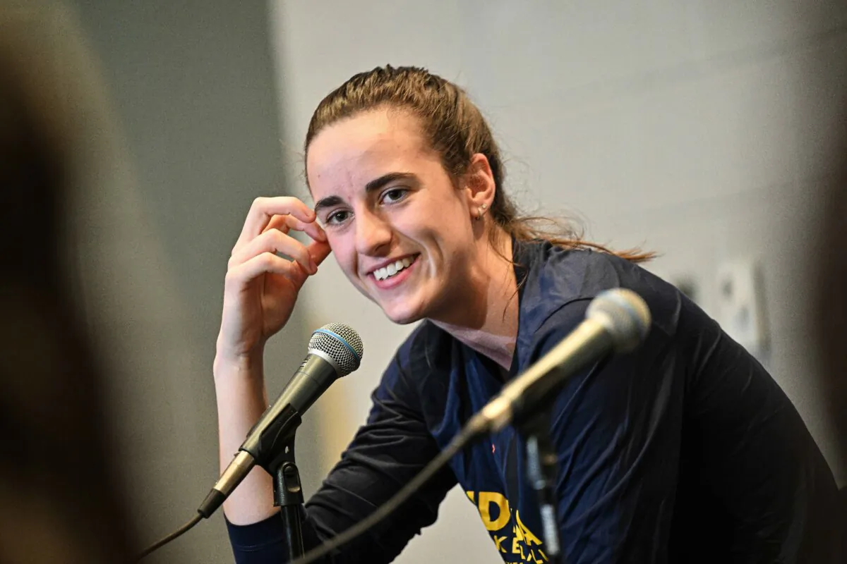 Caitlin Clark #22 of the Indiana Fever speaks during a press conference before the game against the Atlanta Dream at State Farm Arena in Atlanta, Georgia on June 21, 2024. (Paras Griffin/Getty Images)