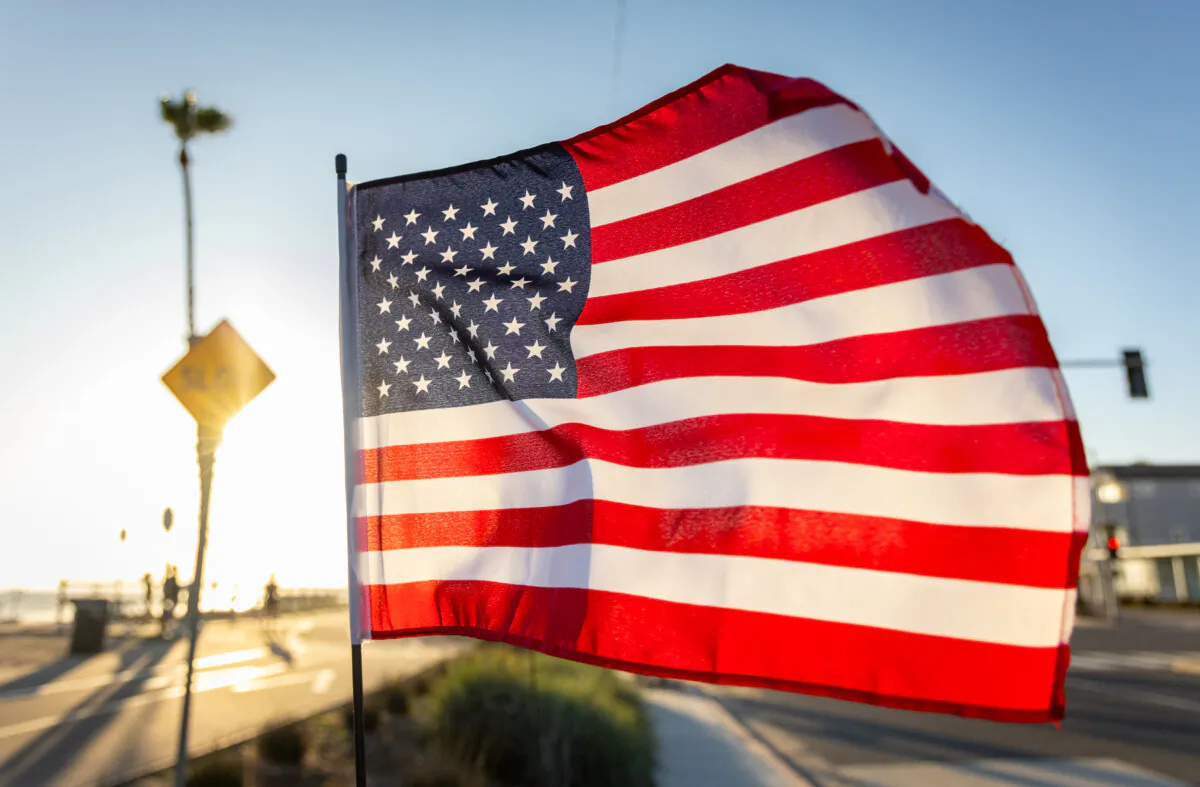 A U.S. flag waves in Huntington Beach, Calif., on July 3, 2024. (John Fredricks/The Epoch Times)