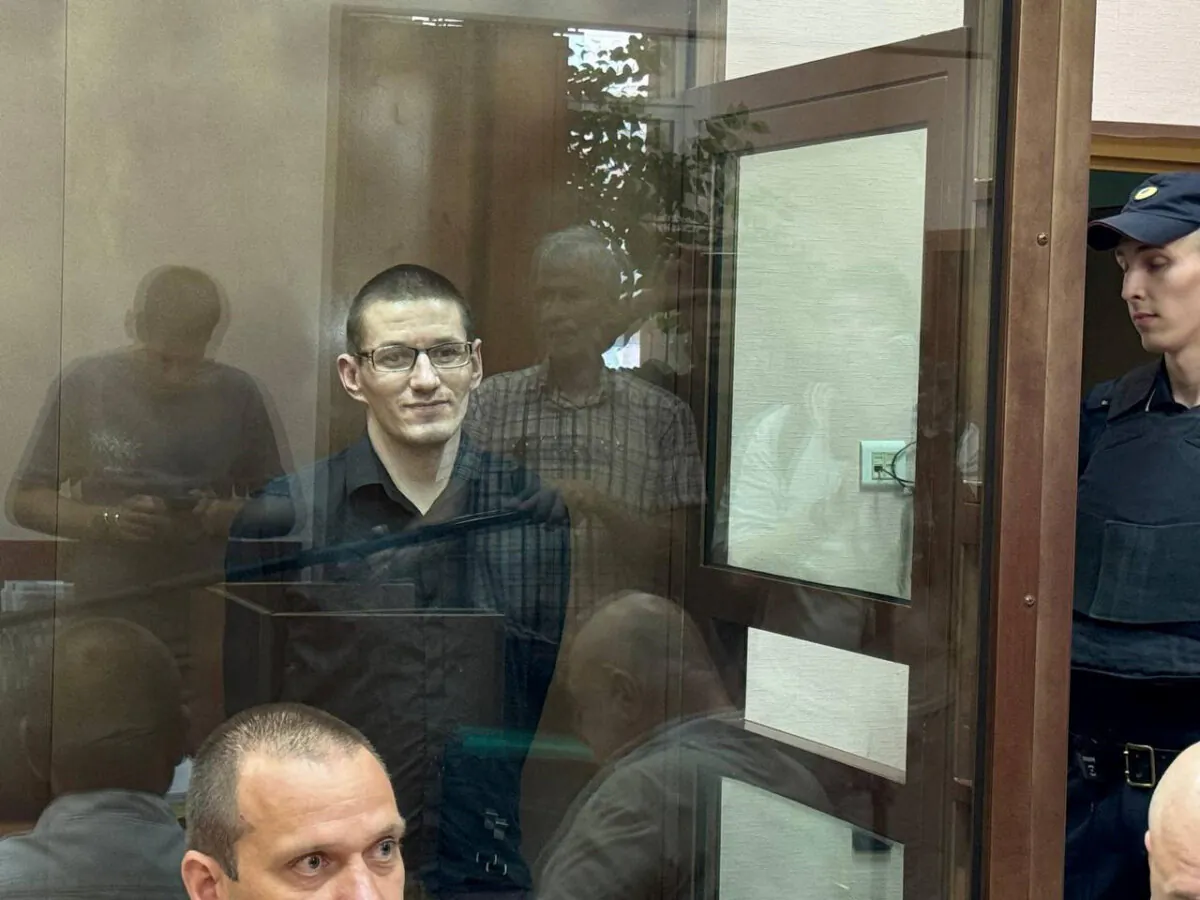 U.S. citizen Robert Woodland, accused of drug trafficking, stands inside an enclosure for defendants as he attends a court hearing in Moscow on July 4, 2024. (Moscow City Court Press Service/Handout via Reuters)