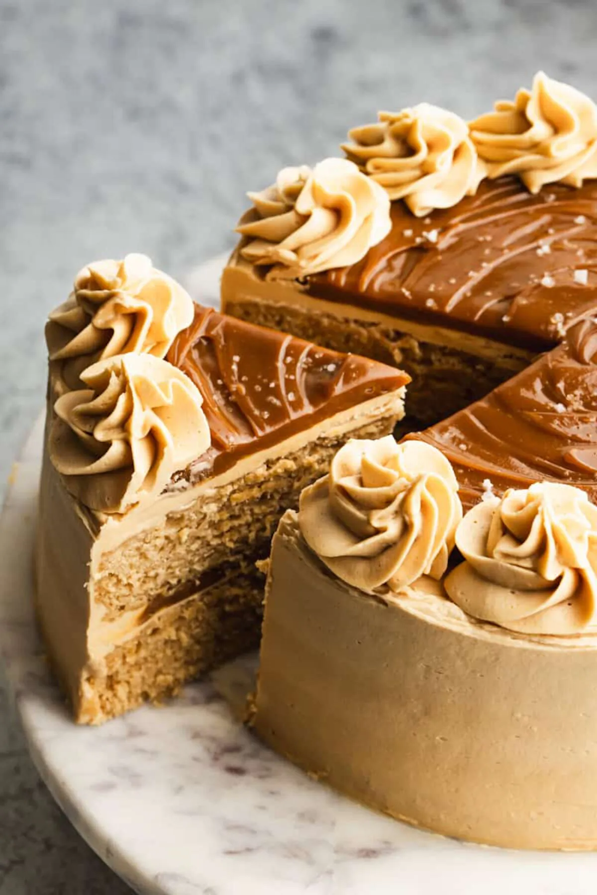 Not only is our Dulce de Leche Cake recipe beautiful, it's a knock-out in flavor, with layers of moist dulce de leche cake and buttercream frosting and pure dulce de leche between layers, too. (Courtesy of Lauren Allen)