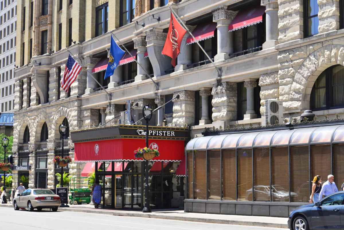 The entrance to the Pfister Hotel on North Jefferson Street in downtown Milwaukee, on July 11, 2019. According to Upgraded Points, the average nightly cost of a hotel in Milwaukee is $350.50, as opposed to $138.31 for an Airbnb. (Tony Savino/Dreamstime/TNS)