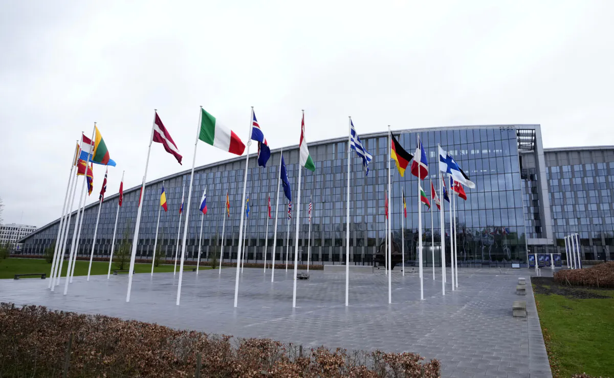 Flags of NATO member countries outside the organization’s headquarters in Brussels on April 3, 2024. (AP Photo/Virginia Mayo)
