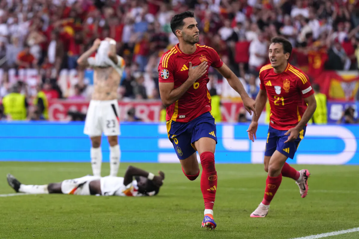 Spain's Mikel Merino celebrates after scoring his sides second goal during a quarter final match between Germany and Spain at the Euro 2024 soccer tournament in Stuttgart, Germany, on July 5, 2024. (Manu Fernandez/AP Photo)