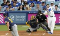 Freeman Singles in the Go-Ahead Runs in 8th and Smith Homers 3 Times as Dodgers Beat Brewers 8–5