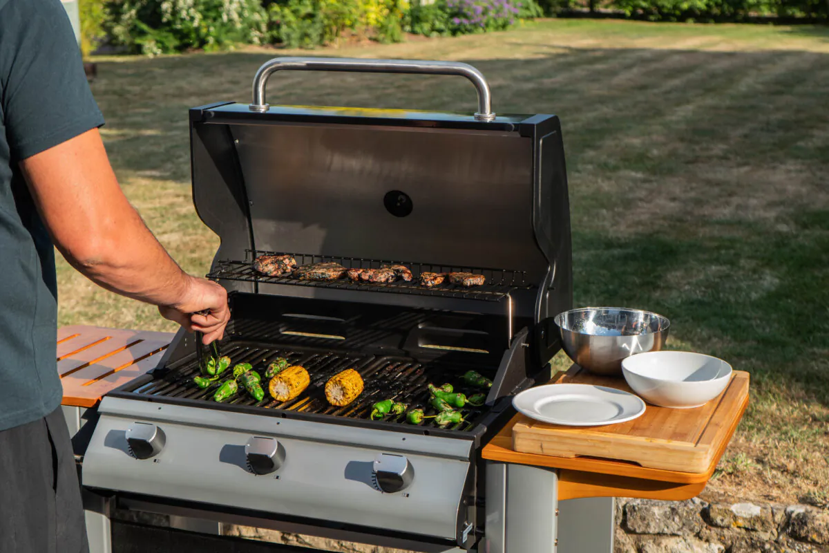 If you plan to grill, take steps to do so safely. (Dreamstime/TNS)