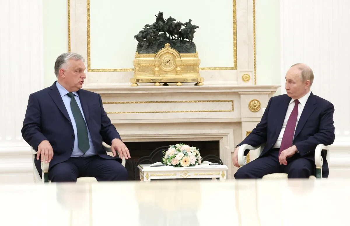 Russian President Vladimir Putin (R) meets with Hungarian Prime Minister Viktor Orban at the Kremlin in Moscow on July 5, 2024. (Valery Sharifulin/AFP via Getty Images)