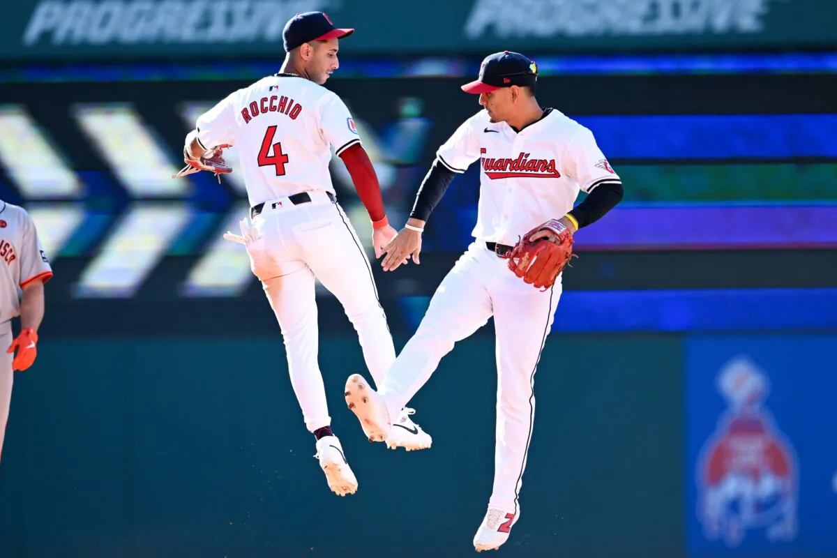Brayan Rocchio (4) and Andrés Giménez (0) of the Cleveland Guardians celebrate the team's win over the San Francisco Giants in Cleveland on July 6, 2024. (Nick Cammett/Getty Images)