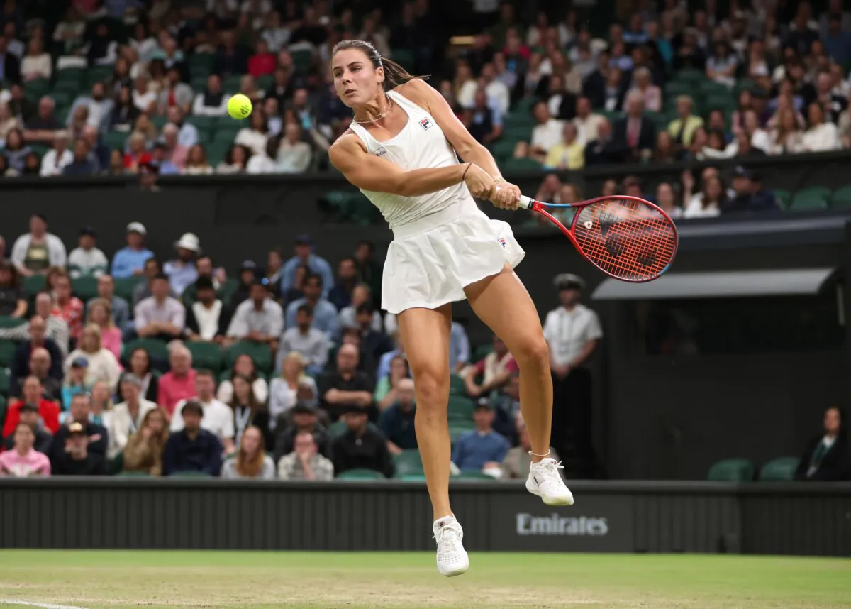 Emma Navarro of United States plays a backhand against Coco Gauff of United States in the Ladies' Singles fourth round match during day seven of The Championships Wimbledon 2024 in London on July 7, 2024. (Clive Brunskill/Getty Images)