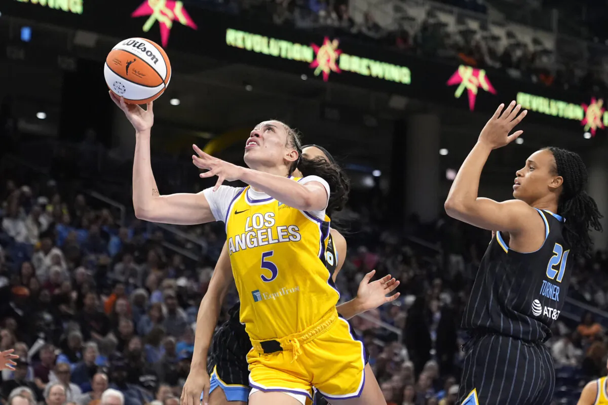 Dearica Hamby of the Los Angeles Sparks drives against the Chicago Sky in Chicago on May 30, 2024. (Charles Rex Arbogast/AP Photo)