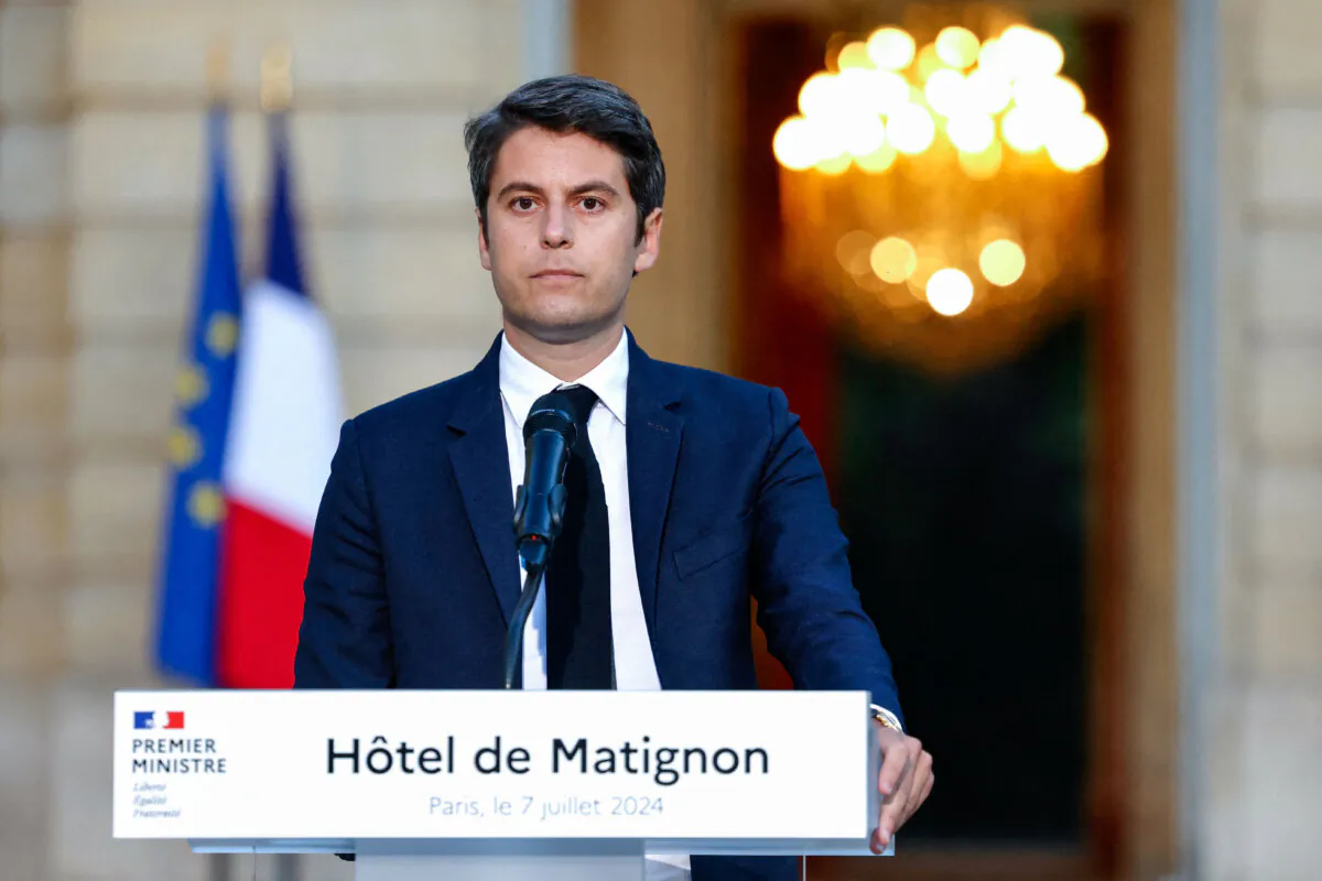 France's Prime Minister Gabriel Attal gives a speech following the first results of the second round of France's legislative election at Matignon in Paris on July 7, 2024. (Ludovic Marin/AFP via Getty Images)