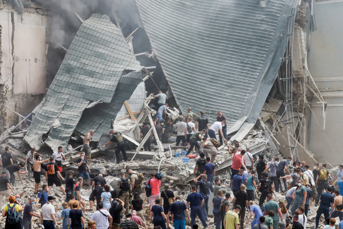 Rescuers work at Ohmatdyt Children's Hospital that was damaged during a Russian missile strikes, in Kyiv, Ukraine, on July 8, 2024. (Gleb Garanich/Reuters)