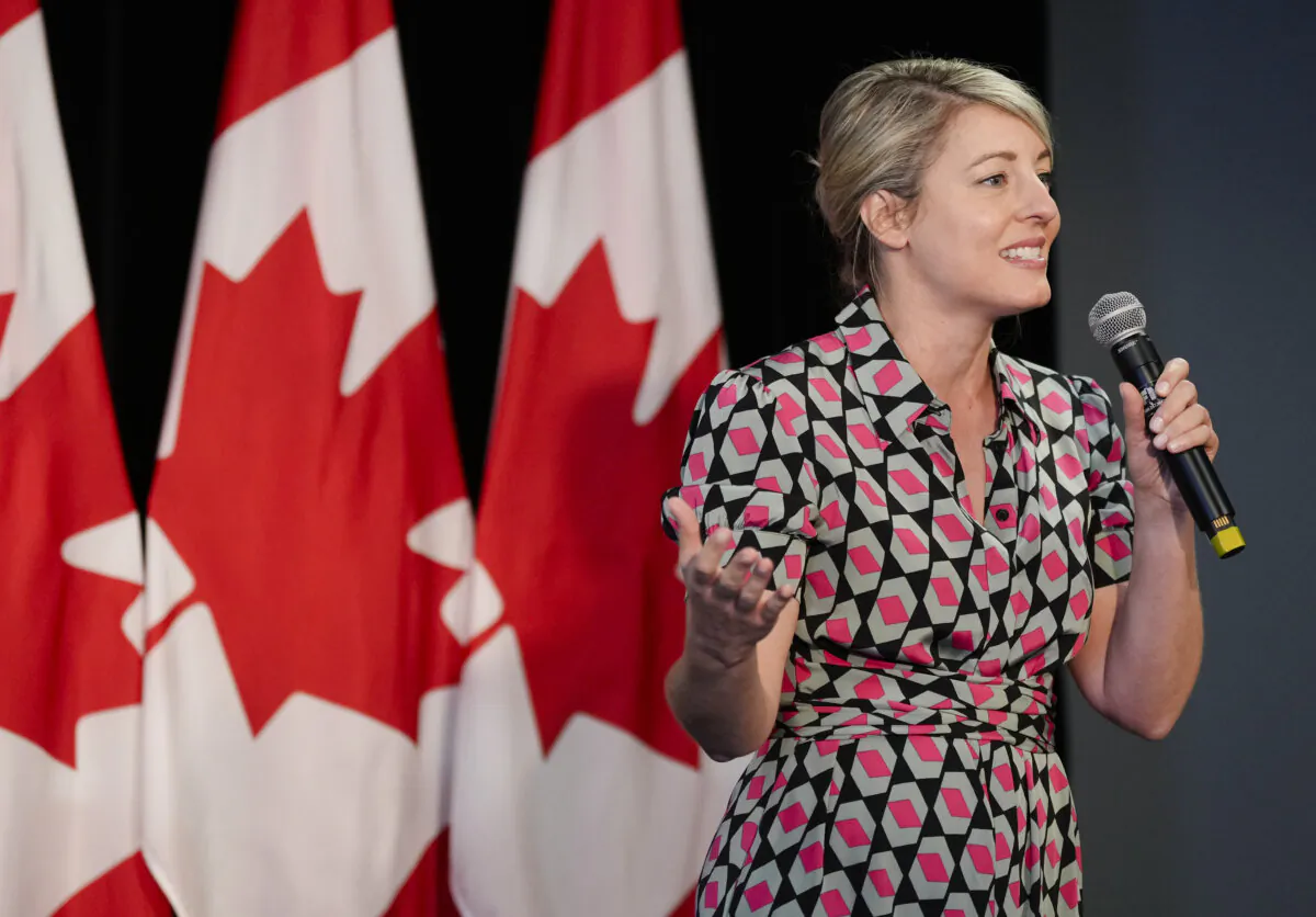 Minister of Foreign Affairs Mélanie Joly introduces Prime Minister Justin Trudeau during a Liberal party fundraiser in Montreal, on July 3, 2024. (The Canadian Press/Christinne Muschi)