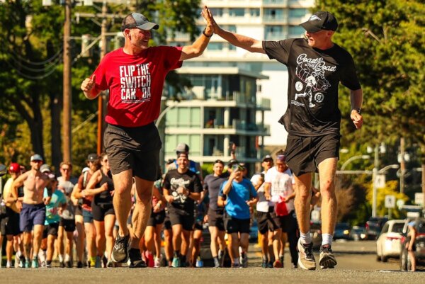 Ryan Keeping, right, finishes his coast-to-coast run across Canada in Victoria, B.C. on July 7. Here, he is seen receiving a high five from his dad, Scott Keeping.<br />(Photo by Josh Pinfold)” width=”600″ height=”401″ class=”cursor-pointer object-cover”/>
            </picture><figcaption>Ryan Keeping, right, finishes his coast-to-coast run across Canada in Victoria, B.C. on July 7. Here, he is seen receiving a high five from his dad, Scott Keeping.<br />(Photo by Josh Pinfold)</figcaption></figure>
</p></div>
<p><h2>A Reason to Run</h2>
<p>        The Canadian icon may have been the inspiration for Mr. Keeping’s coast-to-coast run, but his reasons for embarking on such a time-consuming and physically taxing endeavour were much more personal. Members of his own family suffer from heart disease.
    </p>
<p>“My dad and grandfathers have been affected by heart disease. Recently both of my siblings have tested positive for the gene causing these heart issues,” Mr. Keeping’s GoFundMe page reads.</p>
<p>“I hope to raise funds and awareness through my own run across Canada for the Heart & Stroke Foundation to help other families like mine, who are touched by heart disease.”</p>
<p>The marathon across Canada took months of preparation and training, Mr. Keeping said in a YouTube video posted five days before embarking on his journey. He quit his job just after the New Year to focus on training full-time, taking out a line of credit to supplement his expenses.</p>
<p>“I’m betting on myself to the max,” he said in the March 27 video. “And I want to tell anybody watching this, if there’s something you know you got to do, don’t look for any reason it’s not going to work. Look for that one reason why it will.”</p>
<p>
        The Canada-wide run—and his never-quit attitude—are summed up in the 27-year-old’s catchphrase: “flip the switch.” He has described his “flip the switch” motto as the belief that a shift in mindset can transform anyone’s life and actions. It’s a mantra that has not only kept him going, it’s one he has shared with others each day of his journey.
    </p>
<p>The long-time jogging enthusiast even celebrated his birthday on the road while running through Regina, Sask.</p>
<div class=