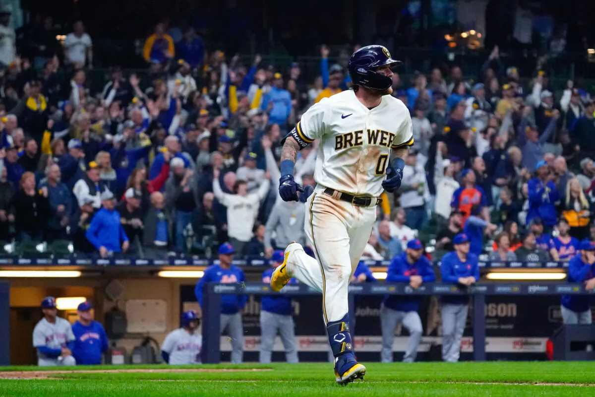 Milwaukee Brewers' Brice Turang, the only position player in the top ten in Wins Above Replacement (WAR) who did not get an invite to the All-Star Game, watches the ball after hitting a grand slam during the fifth inning of a baseball game against the New York Mets in Milwaukee on April 3, 2023. (Aaron Gash/AP Photo)