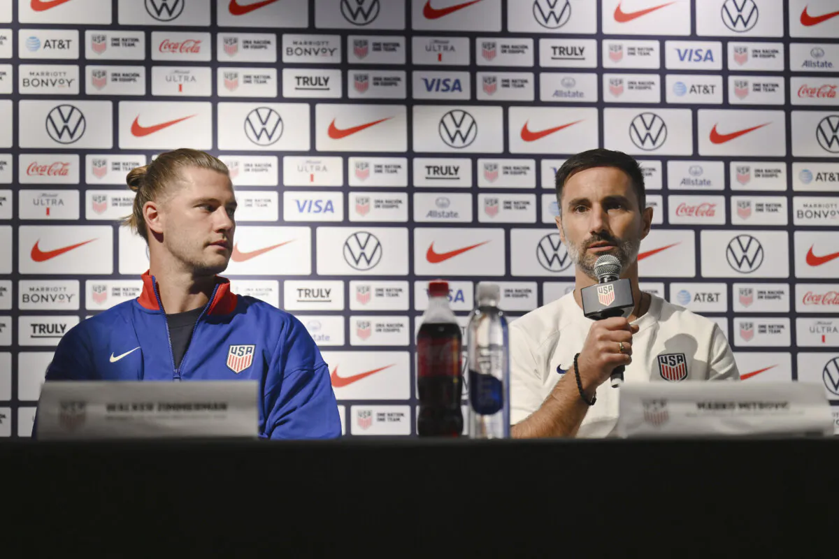 U.S. soccer player Walker Zimmerman (L) and US Olympic men's soccer team head coach Marko Mitrovic speak during a U.S. Olympic women's and men's team press conference in New York on July 8, 2024. (Angela Weiss/AFP via Getty Images)