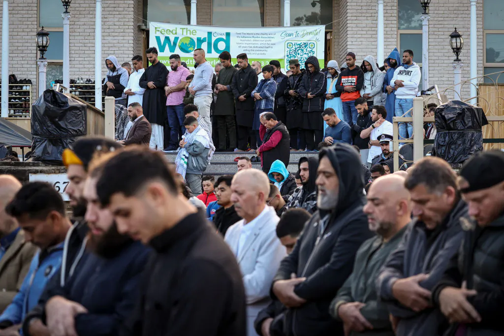 Worshippers participate in Eid al-Fitr prayers, marking the end of the holy month of Ramadan, outside the Lakemba Mosque in Sydney on April 10, 2024. (David Gray/AFP via Getty Images)