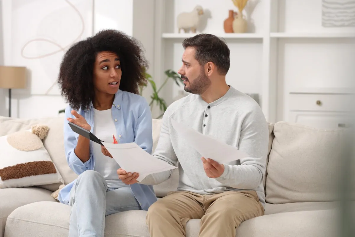 Don't get beat by credit card debt. Stay ahead of payments and don't overspend. (New Africa/Shutterstock)