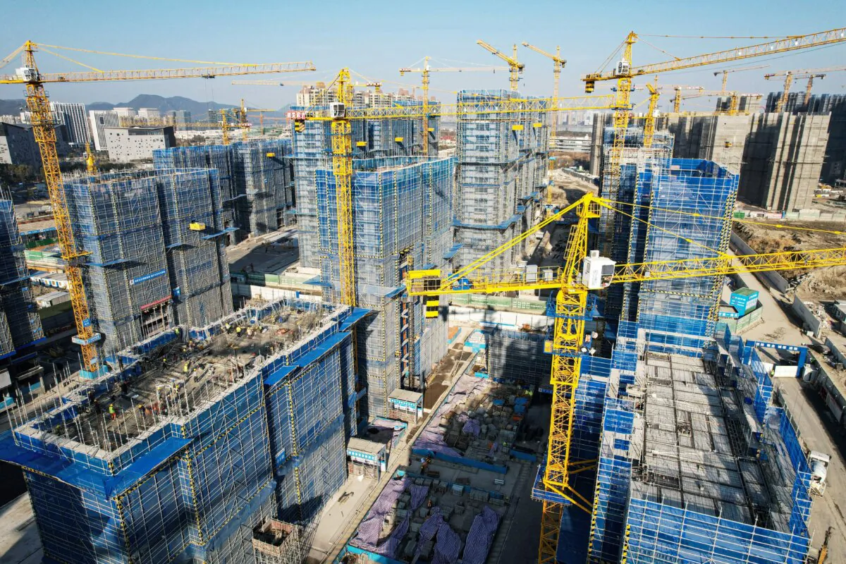 Residential buildings under construction by Chinese real estate developer Vanke in Hangzhou, Zhejiang Province, China, on March 15, 2024. (STR/AFP via Getty Images)