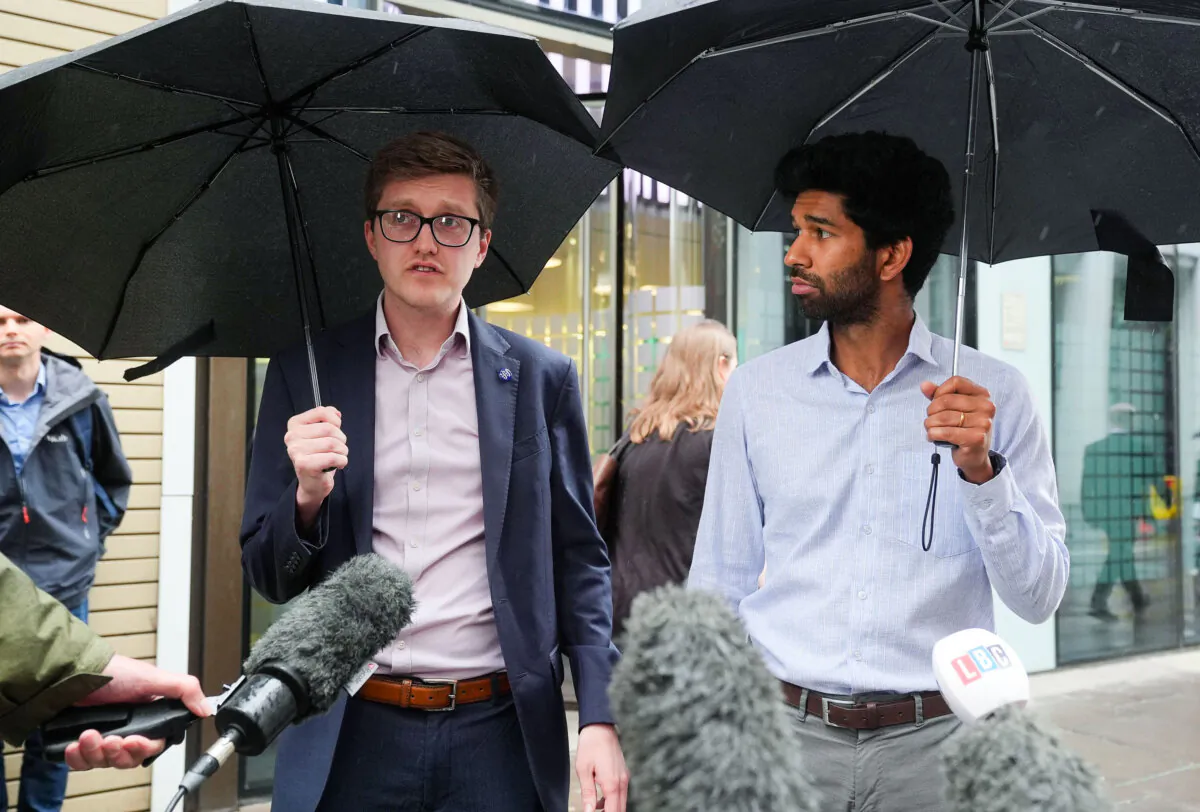 Dr. Robert Laurenson (L) and Vivek Trivedi (R), the co-chairmen of the BMA’s junior doctors’ committee, speak to the media after leaving the Department for Health in central London, following a meeting on July 9, 2024. (Lucy North/PA)