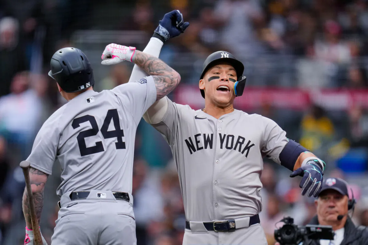 New York Yankees' Aaron Judge (R) celebrates with teammate Alex Verdugo after hitting a two-run home run during the first inning of a baseball game against the San Diego Padres in San Diego on May 25, 2024. (Gregory Bull/AP Photo)