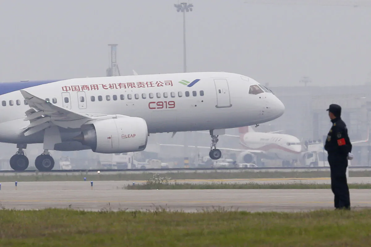 China's C919 passenger jet lands on its maiden flight at Pudong International Airport in Shanghai, China, on May 5, 2017.
(Aly Song/AFP via Getty Images)