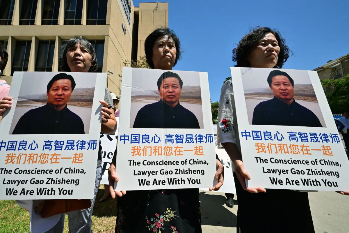 Chinese activists rally for the release of human rights lawyer Gao Zhisheng, on the anniversary of his arrest, in front of the Chinese Consulate in Los Angeles on Aug. 13, 2022. (Federic J. Brown/AFP via Getty Images)