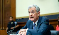 Federal Reserve Could Ease Policy Before Inflation Reaches 2 Percent, Powell Says