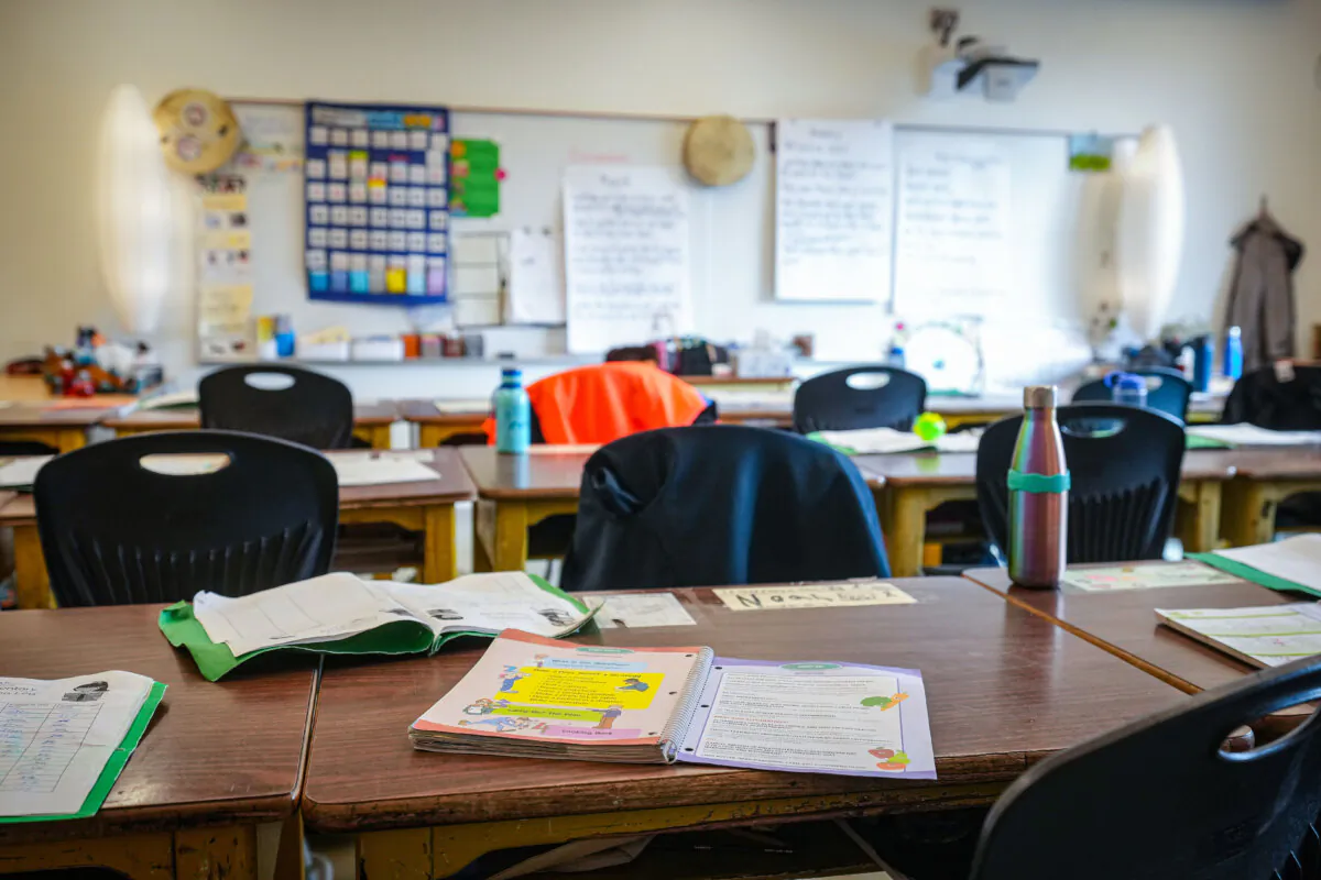 A workbook is seen on a student's desk in an elementary school classroom, in Vancouver, April 13, 2023. (THE CANADIAN PRESS/Darryl Dyck)