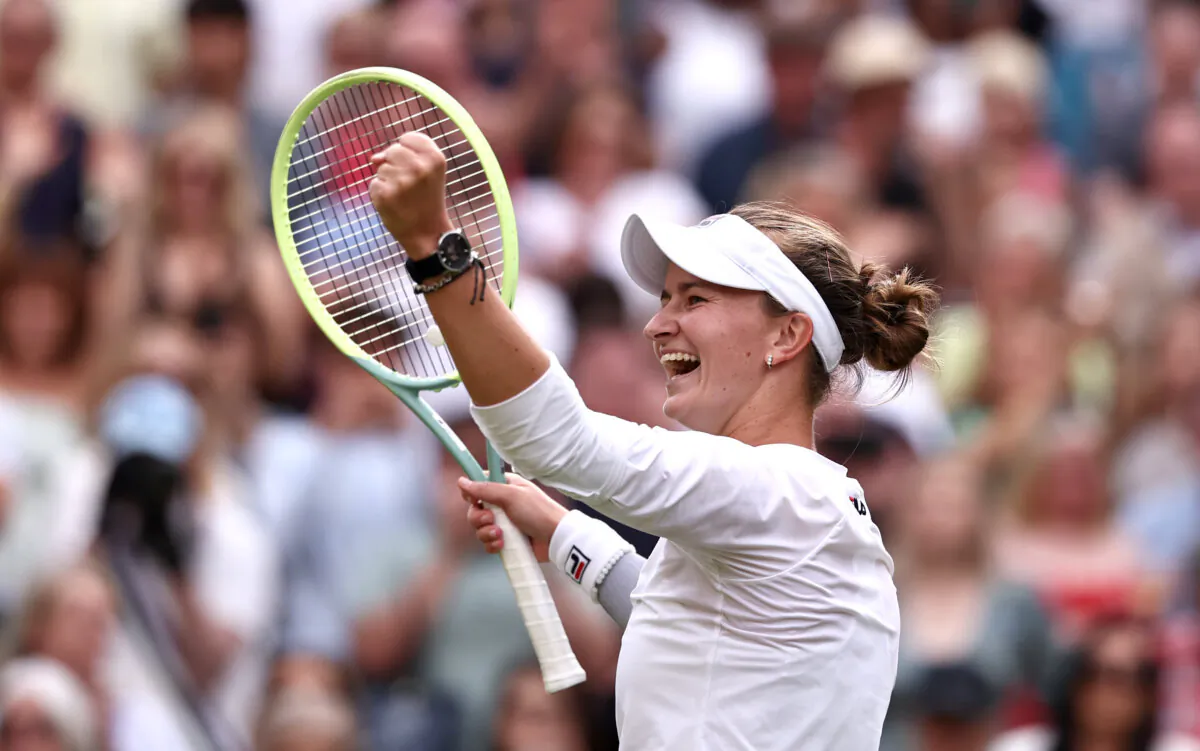 Barbora Krejcikova of Czechia celebrates winning match point against Elena Rybakina of Kazakhstan in the ladies' singles semifinal match during day eleven of The Championships Wimbledon 2024 at All England Lawn Tennis and Croquet Club in London on July 11, 2024. (Francois Nel/Getty Images)