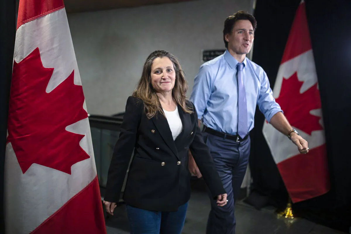 Deputy Prime Minister and Finance Minister Chrystia Freeland, along with Prime Minister Justin Trudeau, arrive at the Hamilton Convention Centre, in Hamilton, Ont., ahead of the Liberal Cabinet retreat, on Jan. 23, 2023. (The Canadian Press/Nick Iwanyshyn)