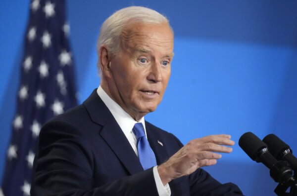 Biden Says He Is Determined to Stay in Race to 'Finish the Job'