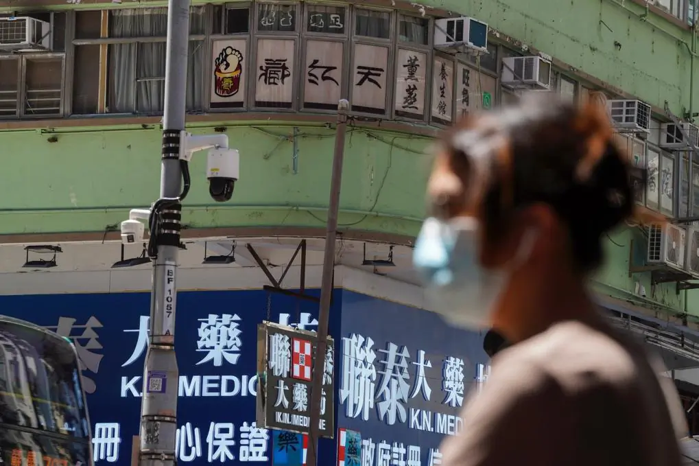 A surveillance camera is shown on a lamp post in Mong Kok, Hong Kong, on July 9, 2024. (Adrian Yu/The Epoch Times)