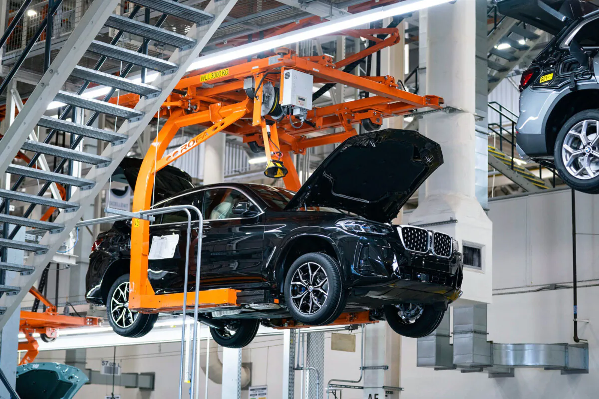 Cars move on the assembly line at the BMW Spartanburg plant in Greer, S.C., on Oct. 19, 2022. (AP Photo/Sean Rayford)