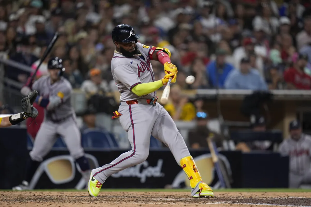 Atlanta Braves' Marcell Ozuna hits a home run during the ninth inning of a baseball game against the San Diego Padres in San Diego on July 12, 2024. (Gregory Bull/AP Photo)