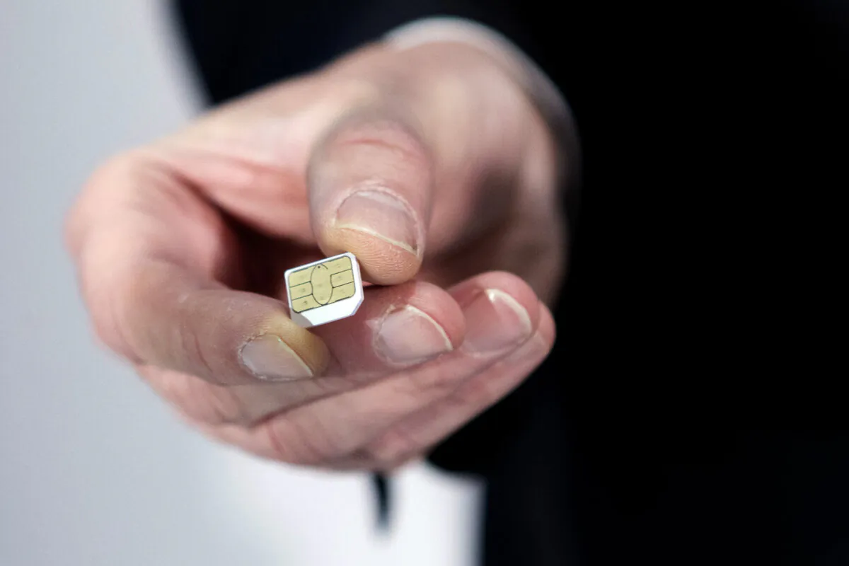 A cell phone SIM card in a file photo. (Kenzo Tribouillard/AFP via Getty Images)