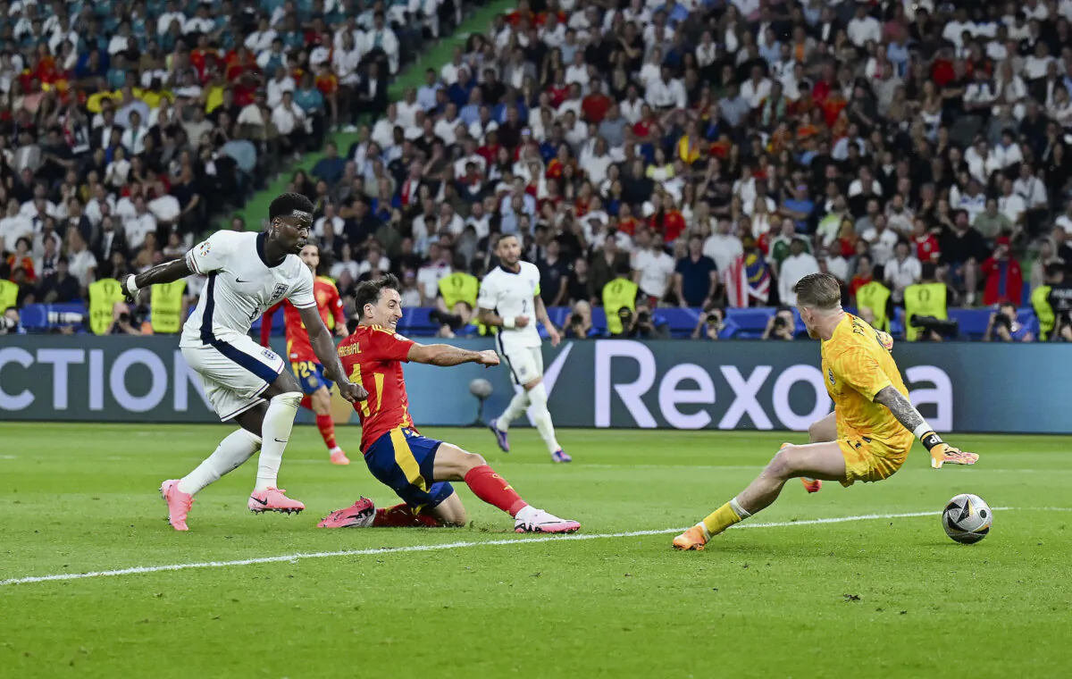 Mikel Oyarzabal of Spain scores his team's second goal as Jordan Pickford of England fails to a make a save during the UEFA EURO 2024 final match between Spain and England in Berlin on July 14, 2024. (Dan Mullan/Getty Images)