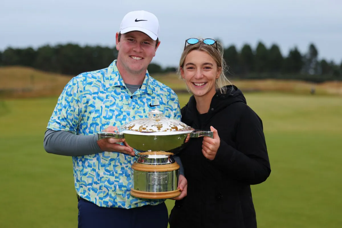 Robert MacIntyre of Scotland poses with his girlfriend, Shannon Hartley at the Genesis Scottish Open in North Berwick, Scotland, on July 14, 2024. (Andrew Redington/Getty Images)
